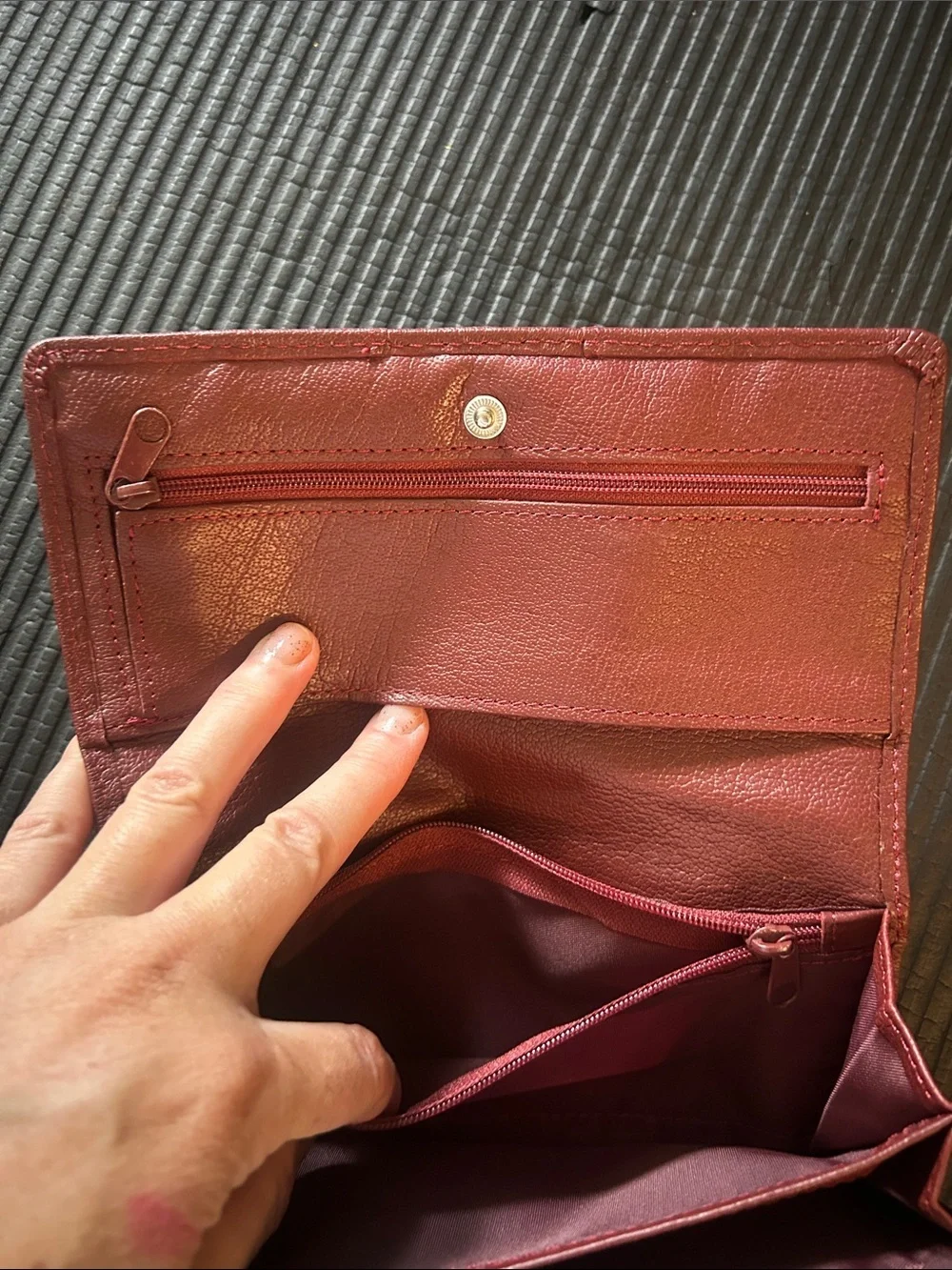 Wilson’s leather, maroon Leather trifold, wallet with Gold Accent